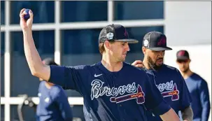 ?? HYOSUB SHIN/ HYOSUB.SHIN@AJC. COM ?? With a 2-8 career record entering last season, no analytics formula could have foreseen Braves pitcher Kyle Wright winning an Nlbest 21 games.