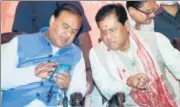  ?? ANI ?? BJP leaders Himanta Biswa Sarma and Sarbananda Sonowal during a public meeting in Guwahati on March 23.
