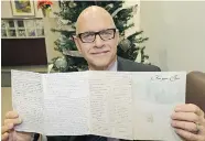  ?? LARRY WONG/Postmedia News ?? Edmonton’s Mike Leggett has been sending and receiving the same Christmas card back and forth with his friend for
more than 30 years. It started as a joke and kept going.