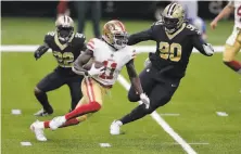  ?? Brett Duke / Associated Press ?? Niners wide receiver Brandon Aiyuk ( 11) might be returning punts when the team resumes its season Nov. 29.