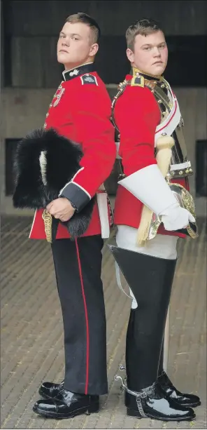  ??  ?? BROTHERS IN ARMS: Guardsman Thomas Dell (left), of the Grenadier Guards, and his twin brother Trooper Ben Dell, of the Household Cavalry, who will both take part in the Trooping the Colour ceremony in London today.