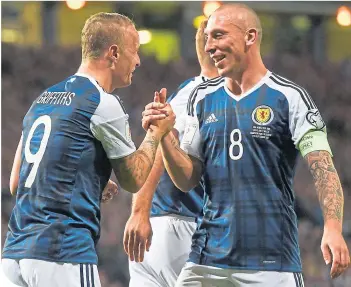  ??  ?? Scott Brown with Leigh Griffiths during his last Scotland cap, against Malta in 2017
