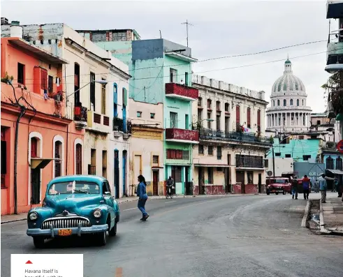  ??  ?? Havana itself is beautiful, with its brightly colored-if slightly dustybuild­ings and milling streets.