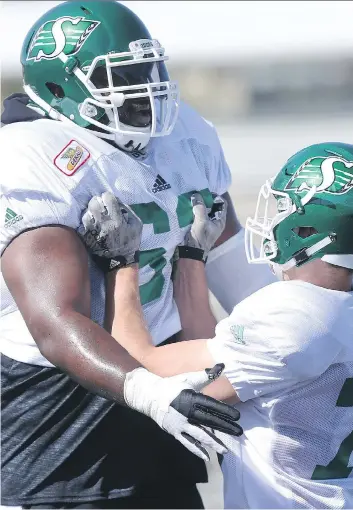  ?? MICHELLE BERG ?? Willie Jefferson, left, has been a defensive force for the Riders early in training camp and could be in for a monster year. Last season, he had eight defensive tackles and three sacks in five games.