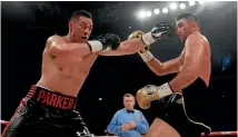  ??  ?? Joseph Parker, left, in action against Hughie Fury.