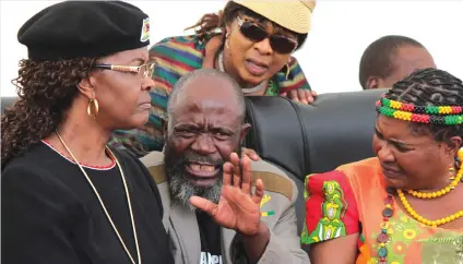  ??  ?? Buhera South Member of National Assembly, Cde Joseph Chinotimba (centre) stresses a point to First Lady, Dr Amai Mugabe, while Minister of State for Manicaland Provincial Affairs, Cde Mandi Chimene (right) and Minister of Women Affairs, Gender and...