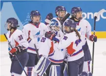  ?? FRANK FRANKLIN II/THE ASSOCIATED PRESS ?? The Korean women’s hockey team, which included players from both North and South, ended its historic Olympic run Tuesday with a fifth straight loss but a host of unforgetta­ble feel-good sparks.