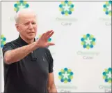  ?? JIim Watson / AFP via Getty Images ?? President-elect Joe Biden makes remarks after receiving the second course of the Pfizer-BioNTech COVID-19 vaccine at Christiana Hospital in Newark, Del., on Monday.