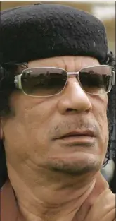  ??  ?? Gaddafi