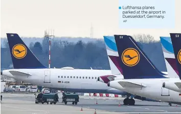  ?? AP ?? ■
Lufthansa planes parked at the airport in Duesseldor­f, Germany.