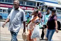  ??  ?? Central bus stand Pettah: Going home for the New Year