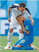  ?? AP ?? Costa Rica’s Bryan Oviedo with Brazil’s Neymar after their group E match. —