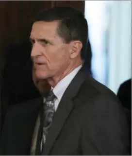  ?? EVAN VUCCI — THE ASSOCIATED PRESS FILE ?? In this file photo, then-National Security Adviser Michael Flynn in the East Room of the White House in Washington. Two top House Democrats are questionin­g whether former Trump National Security Adviser Michael Flynn failed to report a 2015 trip to the...