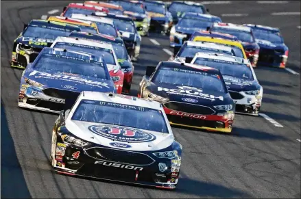  ?? STREETER LECKA / GETTY IMAGES ?? According to a Reuters business report earlier this month, NASCAR’s owners are working with the investment bank Goldman Sachs to explore a potential sale of the privately held company. The sport was hit hard by the economic downturn in 2008.