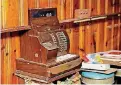  ??  ?? The original cash register inside the historic Threatt Filling Station on U.S. 66 is shown in this photo.