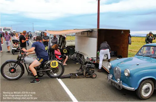  ??  ?? Warming up: Michael’s A30 fits in nicely in the vintage motorcycle pits at the Burt Munro Challenge street race this year