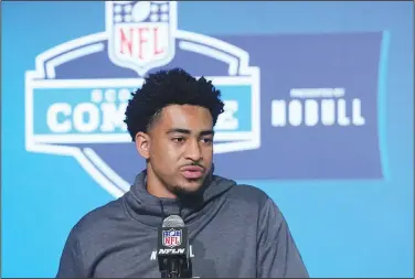  ?? Associated Press ?? Answering questions: Alabama quarterbac­k Bryce Young speaks during a news conference at the NFL football scouting combine Friday in Indianapol­is.