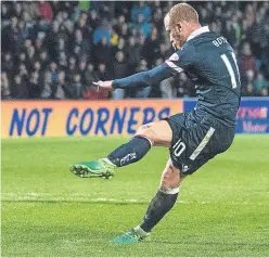  ?? Picture: SNS. ?? Liam Boyce scores his fourth goal.