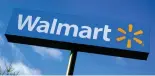  ??  ?? In this Nov. 18, 2020 file photo, a Walmart store sign is visible from Route 28 in Derry, N.H. Walmart Inc., reported on Thursday, Feb. 18, 2021, that it swung to a loss in the fiscal fourth quarter as the sale of its Japan and United Kingdom divisions weighed on results. (AP Photo/Charles Krupa, File)