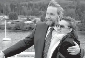  ?? COURTESY OF JOSHUA BERSON ?? Tom Mulcair and his wife, Catherine, on the ferry to Saltspring Island, B.C., in 2014. They met at a wedding in the Laurentian­s in 1974; she was in from Paris, representi­ng the groom’s French relatives.