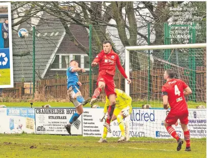  ?? Photos by William Mccandlish ?? Battle It was a challengin­g afternoon in filthy conditions in Stranraer.
