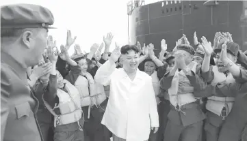  ??  ?? Kim Jong Un is pictured during a test-fire of strategic submarine-launched ballistic missile in this undated photo released by North Korea’s Korean Central News Agency (KCNA) in Pyongyang. — Reuters photos