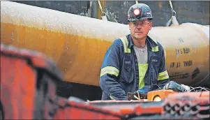  ?? "1 1)050 %",& ,"/( ?? A miner runs a coal continuous miner at a coal mine in Friedens, Pa., on Wednesday. Corsa Coal Corp. says the mine will create 70 to 100 new jobs and produce some 400,000 tons of metallurgi­cal coal a year. President Donald Trump referred to the mine’s...