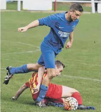  ??  ?? RCA Grangetown Florists (blue) take on Ryhope Foresters in their recent derby at Meadow Park.