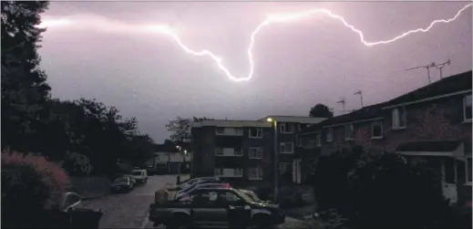  ?? Picture: Andy Clark ?? Lightning over Ashford on Sunday morning