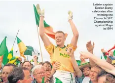  ??  ?? Leitrim captain Declan Darcy celebrates after winning the Connacht SFC Championsh­ip against Mayo in 1994