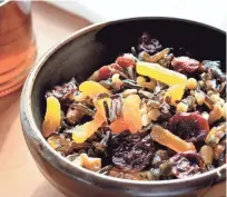  ??  ?? Mahnomin Porridge is a Native American breakfast dish of wild rice and dried fruits that is popular in Minnesota.