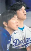  ?? THE ASSOCIATED PRESS ?? Dodgers star Shohei Ohtani, right, says his former translator Ippei Mizuhara, left, stole money from him and made large, illegal bets without his knowledge.