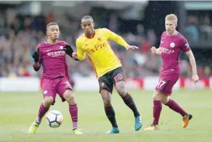  ?? — Reuters ?? Watford’s Andre Carrillo in action with Manchester City’s Gabriel Jesus and Kevin De Bruyne (right).