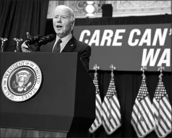  ?? EVAN VUCCI / ASSOCIATED PRESS ?? President Joe Biden speaks Tuesday during a rally at Union Station in Washington about proposed spending on child care and other investment­s in the “care economy.”
