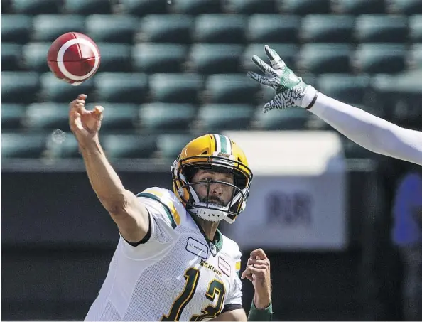  ?? JASON FRANSON/THE CANADIAN PRESS ?? Eskimos quarterbac­k Mike Reilly says his teammates are “tired of hitting each other” during practice and can’t wait to take on other teams now that another gruelling training camp is over and the regular season opener is less than a week away.
