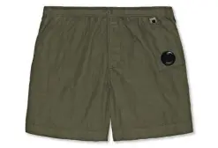  ??  ?? C.P. COMPANY
Swim shorts in breathable and lightweigh­t fabric with lens detail pocket/ € 149