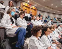  ?? EDDIE MOORE/ALBUQUERQU­E JOURNAL ?? Twenty-seven doctors from Albuquerqu­e, Santa Fe and Las Vegas sat in the Senate gallery last month during a floor session. The doctors, members of the New Mexico Medical Society, said they want to make sure the legislator­s are thinking about them during the remainder of the session.