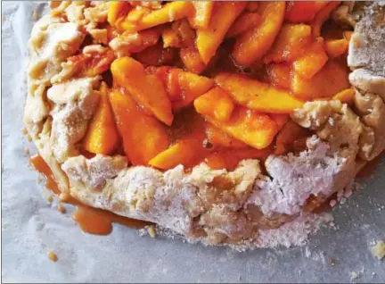 ?? PHOTO BY EMILY RYAN ?? After assembling and before baking, chill this peach crostata for better results.