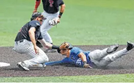  ?? Photos by Brad Tollefson / Associated Press ?? Texas Tech's Michael Davis (left) tags out Duke's Joey Loperfido as he slides into second base in Saturday’s Game 1 of their super regional. Tech prevailed 8-4.