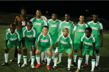  ?? ?? The Silver Fox... Masinga (far right - front row) with the star-studded Namibian Newspaper Shadow team. Back row from left: Maximilian ‘Slimkat’ Mbaeva, Dacosta Angula, Sedecias Haukambe, Alfred Ndyenge, Brian Bantam and Willem ‘Dudes’ Mwedihanga (capt). Front row from left: Pat-Nevin Uanivi, Wycliff Kambonde, Eusebio Fredericks, Klaas Blom and Edison ‘Masinga’ Muheua.