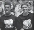  ?? JONATHAN HAYWARD/ THE CANADIAN PRESS ?? Team Canada’s Karina LeBlanc, left, and Christine Sinclair have fun at FIFA unveiling.