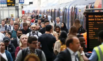  ?? Photograph: James Manning/PA ?? Commuters at London Waterloo station last month. ‘Pretending that Covid is no longer a problem only increases the threat it poses.’