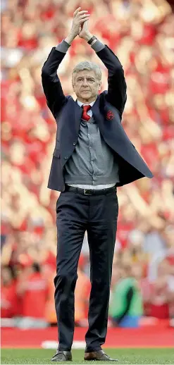  ?? AP ?? Arsenal manager Arsene Wenger applauds on his lap of honour at the Emirates Stadium in London on Sunday after his last home game in charge. The Gunners beat Burnley 5-0. —