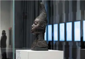  ?? ?? stolen during the colonial era, dozens of benin bronzes that once decorated the royal palace of the Kingdom of benin will go on show for one last time in berlin before being repatriate­d to Nigeria.