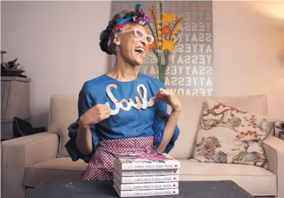  ?? MARVIN JOSEPH/THE WASHINGTON POST ?? Carla Hall’s new book, which explores her heritage, is her attempt to bring soul food to a wider audience.