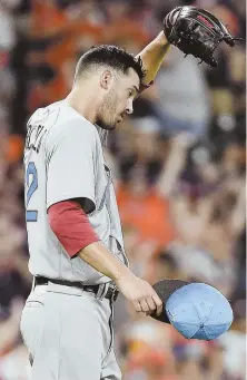  ?? AP PHOTO ?? TEXAS TOAST: Sox starter Rick Porcello reacts after giving up a two-run home run to Astros slugger Carlos Beltran during the third inning last night in Houston.