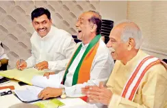  ?? P. Surendra ?? TS BJP president K. Laxman chairs a meeting of the party’s election committee at the party office at Nampally in Hyderabad on Friday. —