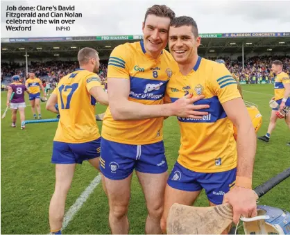  ?? INPHO ?? Job done: Clare’s David Fitzgerald and Cian Nolan celebrate the win over Wexford