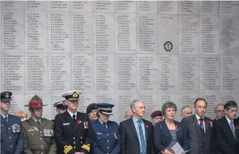  ?? Picture / Peter Meecham ?? Auckland Mayor Phil Goff and other dignitarie­s are dwarfed by the names of the fallen on the Auckland War Memorial Museum walls at Wednesday’s memorial service for the 99th anniversar­y of the Battle of Passchenda­ele.