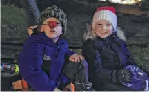  ?? Josh Healey ?? Wyatt Parnell (left) and Carter Penney, both of New Germany, were all smiles during the Chronicle Herald Christmas on the Lahave parade.